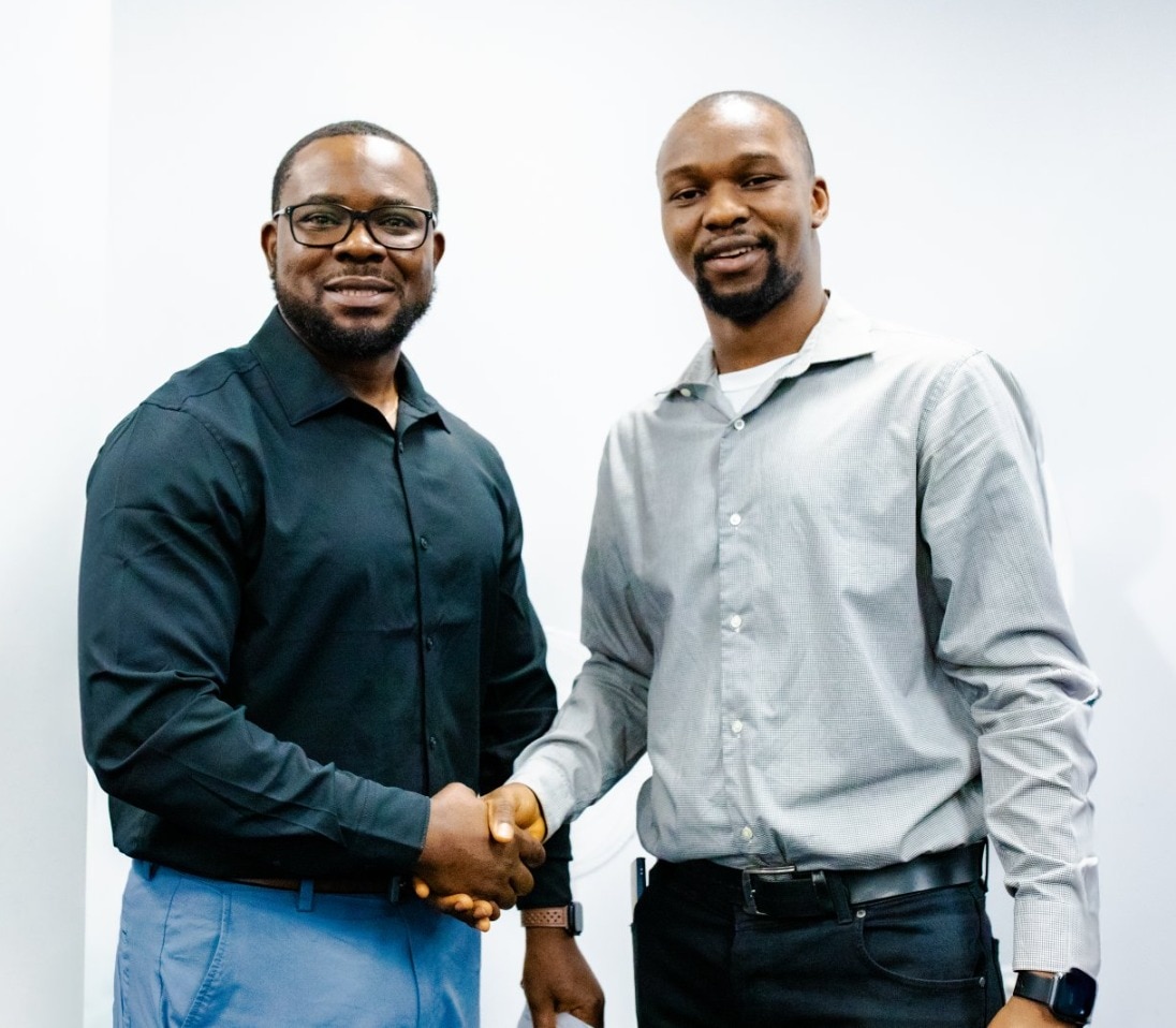 two men shaking hands as part of Citi Foundation selecting NPower as Canada grant recipient