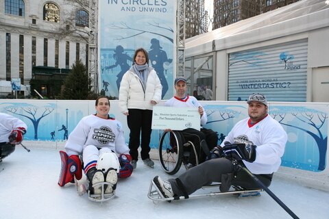 Paralympians and Wounded Warriors participate in sled hockey demo at Citi Pond