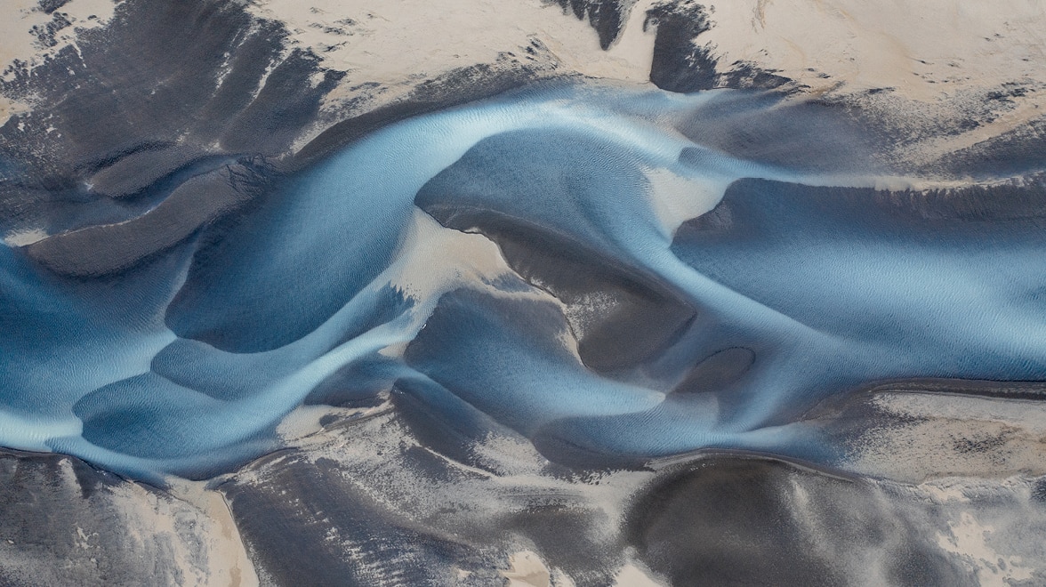 Arial view image of blue wave.