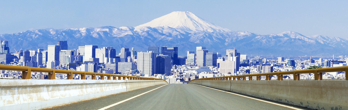 Road view in Japan with mountain in the background