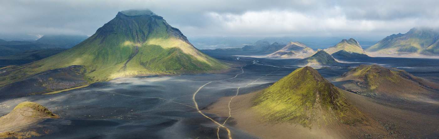image of grey and green hills