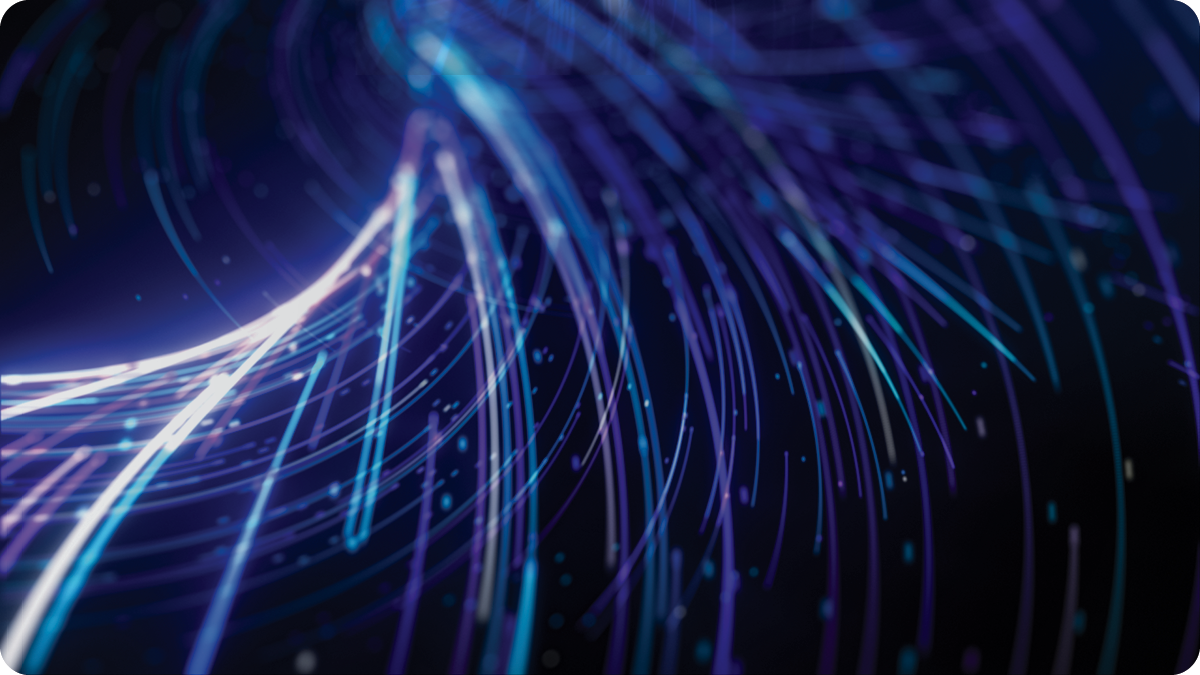 Abstract blue and purple light trails flowing across a dark background.